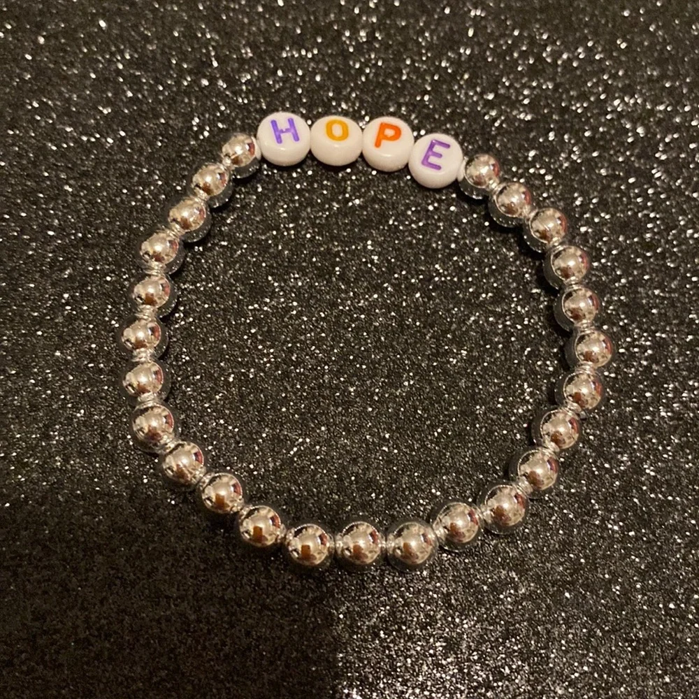 Girls faux silver bead hope stretch bracelet